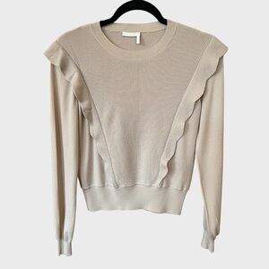Chloe ruffle-trimmed wool sweater.